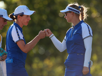 GAINESVILLE, VIRGINIA - SEPTEMBER 14: Carlota Ciganda of Team Europe celebrates with Emily Kristine Pedersen of Team Europe on the 17th gree...