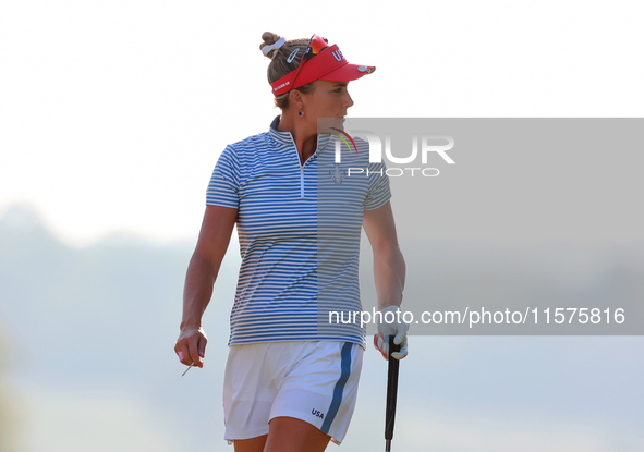 GAINESVILLE, VIRGINIA - SEPTEMBER 14: Lexi Thompson of the United States walks on the 17th green during Day Two of the Solheim Cup at Robert...