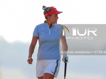 GAINESVILLE, VIRGINIA - SEPTEMBER 14: Lexi Thompson of the United States walks on the 17th green during Day Two of the Solheim Cup at Robert...