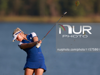 GAINESVILLE, VIRGINIA - SEPTEMBER 14: Charley Hull of Team Europe hits from the 17th fairway during Day Two of the Solheim Cup at Robert Tre...