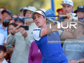 GAINESVILLE, VIRGINIA - SEPTEMBER 14: Georgia Hall of Team Europe hits from the 15th tee during Day Two of the Solheim Cup at Robert Trent J...