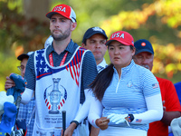 GAINESVILLE, VIRGINIA - SEPTEMBER 14: Allisen Corpuz of the United States looks with her caddie from the 15th tee during Day Two of the Solh...