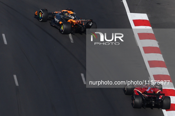 Oscar Piastri of McLaren and Charles Leclerc of Ferrari during the Formula 1 Grand Prix of Azerbaijan at Baku City Circuit in Baku, Azerbaij...