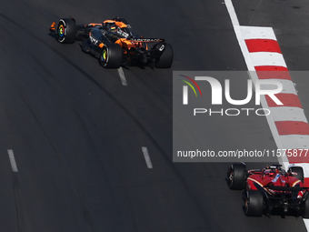 Oscar Piastri of McLaren and Charles Leclerc of Ferrari during the Formula 1 Grand Prix of Azerbaijan at Baku City Circuit in Baku, Azerbaij...