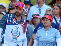 GAINESVILLE, VIRGINIA - SEPTEMBER 14: Lilia Vu of Team USA looks with her caddie from the 15th tee during Day Two of the Solheim Cup at Robe...