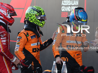 Charles Leclerc of Ferrari, Lando Norris and Oscar Piastri of McLaren after the Formula 1 Grand Prix of Azerbaijan at Baku City Circuit in B...