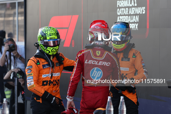 Lando Norris of McLaren, Charles Leclerc of Ferrari and Oscar Piastri of McLaren after the Formula 1 Grand Prix of Azerbaijan at Baku City C...