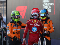 Lando Norris of McLaren, Charles Leclerc of Ferrari and Oscar Piastri of McLaren after the Formula 1 Grand Prix of Azerbaijan at Baku City C...