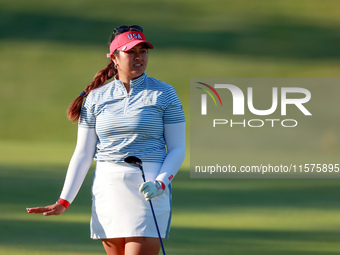 GAINESVILLE, VIRGINIA - SEPTEMBER 14: Lilia Vu of Team USA gestures after hitting from the 15th fairway during Day Two of the Solheim Cup at...