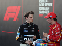 Oscar Piastri of McLaren and Charles Leclerc of Ferrari after the Formula 1 Grand Prix of Azerbaijan at Baku City Circuit in Baku, Azerbaija...