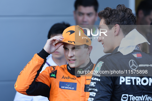 Oscar Piastri of McLaren and George Russell of Mercedes after the Formula 1 Grand Prix of Azerbaijan at Baku City Circuit in Baku, Azerbaija...