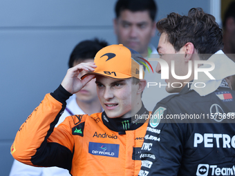 Oscar Piastri of McLaren and George Russell of Mercedes after the Formula 1 Grand Prix of Azerbaijan at Baku City Circuit in Baku, Azerbaija...