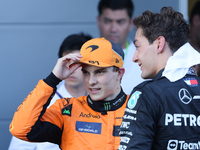 Oscar Piastri of McLaren and George Russell of Mercedes after the Formula 1 Grand Prix of Azerbaijan at Baku City Circuit in Baku, Azerbaija...