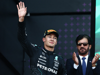 George Russell of Mercedes and Mohammed Ben Sulayem after the Formula 1 Grand Prix of Azerbaijan at Baku City Circuit in Baku, Azerbaijan on...