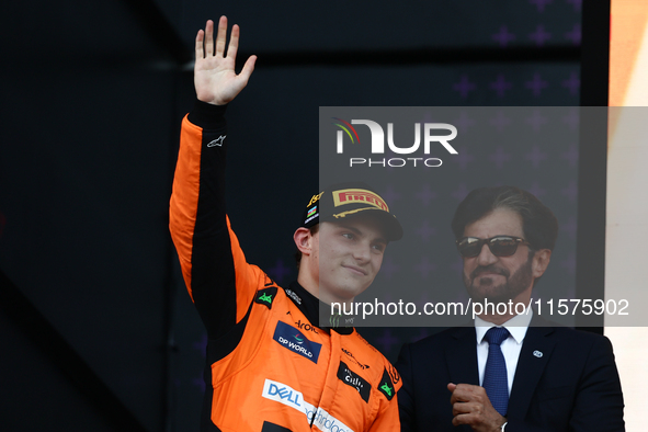 Oscar Piastri of McLaren and Mohammed Ben Sulayem after the Formula 1 Grand Prix of Azerbaijan at Baku City Circuit in Baku, Azerbaijan on S...