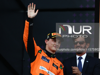 Oscar Piastri of McLaren and Mohammed Ben Sulayem after the Formula 1 Grand Prix of Azerbaijan at Baku City Circuit in Baku, Azerbaijan on S...