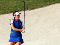 GAINESVILLE, VIRGINIA - SEPTEMBER 14: Georgia Hall of Team Europe hits from the bunker on the 15th fairway during Day Two of the Solheim Cup...