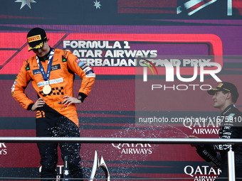 Oscar Piastri of McLaren and George Russell of Mercedes after the Formula 1 Grand Prix of Azerbaijan at Baku City Circuit in Baku, Azerbaija...