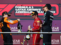 Oscar Piastri of McLaren, Charles Leclerc of Ferrari and George Russell of Mercedes after the Formula 1 Grand Prix of Azerbaijan at Baku Cit...