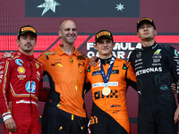 Charles Leclerc of Ferrari, Oscar Piastri of McLaren and George Russell of Mercedes after the Formula 1 Grand Prix of Azerbaijan at Baku Cit...