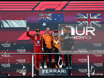 Charles Leclerc of Ferrari, Oscar Piastri of McLaren and George Russell of Mercedes after the Formula 1 Grand Prix of Azerbaijan at Baku Cit...