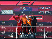 Charles Leclerc of Ferrari, Oscar Piastri of McLaren and George Russell of Mercedes after the Formula 1 Grand Prix of Azerbaijan at Baku Cit...