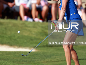 GAINESVILLE, VIRGINIA - SEPTEMBER 14: Georgia Hall of Team Europe hits to the 14th green during Day Two of the Solheim Cup at Robert Trent J...