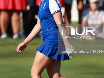 GAINESVILLE, VIRGINIA - SEPTEMBER 14: Charley Hull of Team Europe walks to the 14th green during Day Two of the Solheim Cup at Robert Trent...