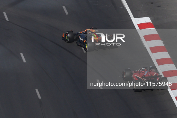 Oscar Piastri of McLaren and Charles Leclerc of Ferrari during the Formula 1 Grand Prix of Azerbaijan at Baku City Circuit in Baku, Azerbaij...