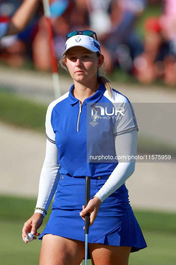 GAINESVILLE, VIRGINIA - SEPTEMBER 14: Emily Kristine Pedersen of Team Europe walks on the 14th green during Day Two of the Solheim Cup at Ro...