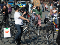 A hundred people take part in a bike demonstration to mark the second anniversary of Mahsa Amini's death for the Woman, Life, and Freedom mo...