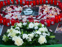 A memorial site with candle lights is set as a hundred people take part in a bike demonstration to mark the second anniversary of Mahsa Amin...