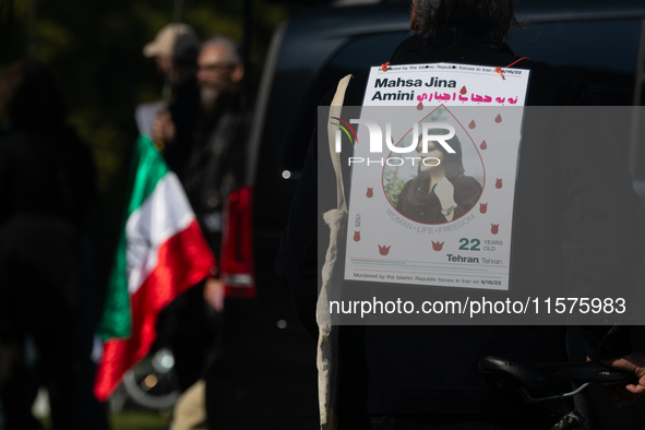 A hundred people take part in a bike demonstration to mark the second anniversary of Mahsa Amini's death for the Woman, Life, and Freedom mo...