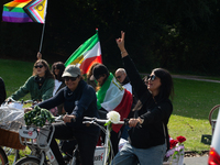 A hundred people take part in a bike demonstration to mark the second anniversary of Mahsa Amini's death for the Woman, Life, and Freedom mo...