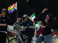 A hundred people take part in a bike demonstration to mark the second anniversary of Mahsa Amini's death for the Woman, Life, and Freedom mo...