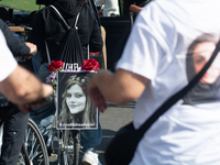 A hundred people take part in a bike demonstration to mark the second anniversary of Mahsa Amini's death for the Woman, Life, and Freedom mo...