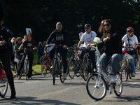 A hundred people take part in a bike demonstration to mark the second anniversary of Mahsa Amini's death for the Woman, Life, and Freedom mo...