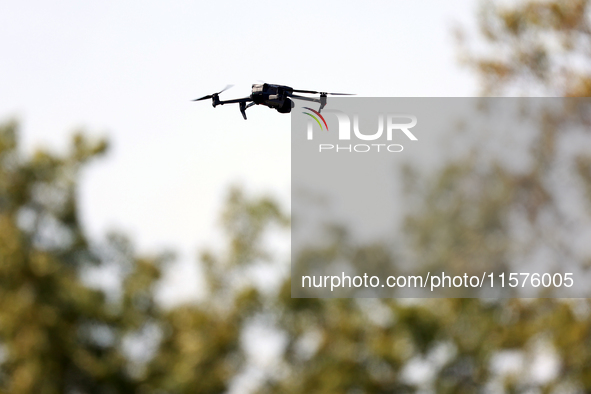 GAINESVILLE, VIRGINIA - SEPTEMBER 14: A drone flies over the 1st tee during Day Two of the Solheim Cup at Robert Trent Jones Golf Club on Sa...