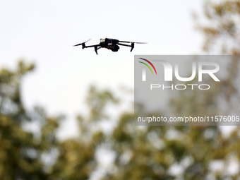 GAINESVILLE, VIRGINIA - SEPTEMBER 14: A drone flies over the 1st tee during Day Two of the Solheim Cup at Robert Trent Jones Golf Club on Sa...