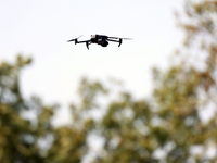 GAINESVILLE, VIRGINIA - SEPTEMBER 14: A drone flies over the 1st tee during Day Two of the Solheim Cup at Robert Trent Jones Golf Club on Sa...