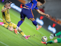 Houston Dynamo midfielder Coco Carrasquilla (20) takes a shot, but it is blocked during a match between Houston Dynamo and Real Salt Lake at...