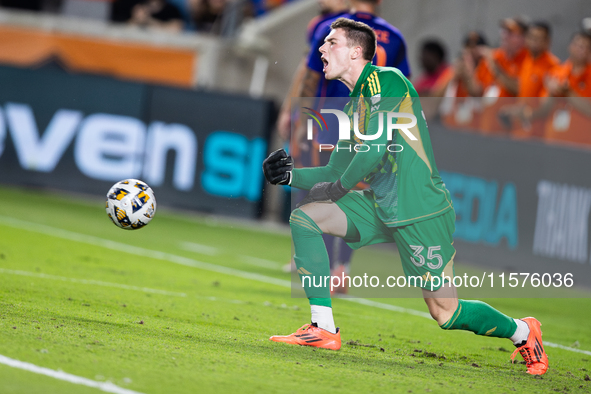 Moments after Houston Dynamo player Griffin Dorsey scores a goal, Real Salt Lake goalkeeper Gavin Beavers (35) angrily throws the ball durin...