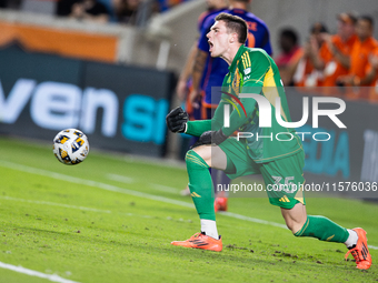 Moments after Houston Dynamo player Griffin Dorsey scores a goal, Real Salt Lake goalkeeper Gavin Beavers (35) angrily throws the ball durin...