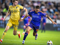 Real Salt Lake defender Philip Quinton (26) chases Houston Dynamo forward Ezequiel Ponce (10) down the field during a match between Houston...