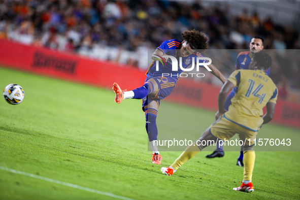 Houston Dynamo midfielder Coco Carrasquilla kicks the ball during a match between Houston Dynamo and Real Salt Lake at Shell Energy Stadium...