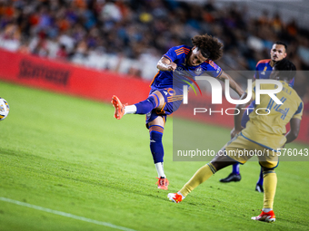 Houston Dynamo midfielder Coco Carrasquilla kicks the ball during a match between Houston Dynamo and Real Salt Lake at Shell Energy Stadium...