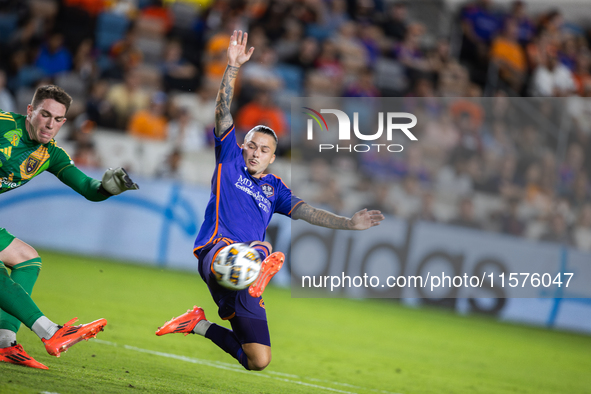 Houston Dynamo midfielder Sebastian Kowalczyk (27) blocks a kick from Real Salt Lake goalkeeper Gavin Beavers (35) during a match between Ho...