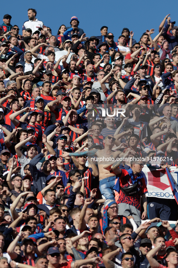 Fans of San Lorenzo cheer for their team during a match between San Lorenzo and Velez as part of Copa de la Liga 2024 at Estadio Pedro Bideg...