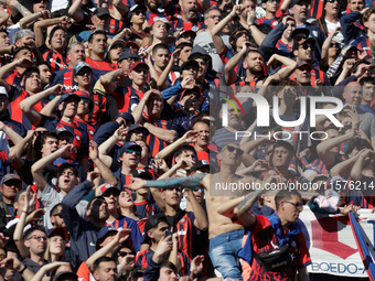 Fans of San Lorenzo cheer for their team during a match between San Lorenzo and Velez as part of Copa de la Liga 2024 at Estadio Pedro Bideg...