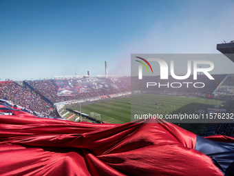 Fans of San Lorenzo cheer for their team before a match between San Lorenzo and Velez as part of Copa de la Liga 2024 at Estadio Pedro Bideg...